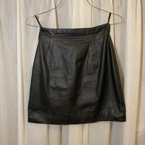 Black leather mini skirt